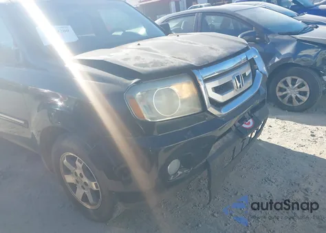 2010 Honda Pilot Touring z USA, uszkodzony, nr VIN 5FNYF3H98AB003267